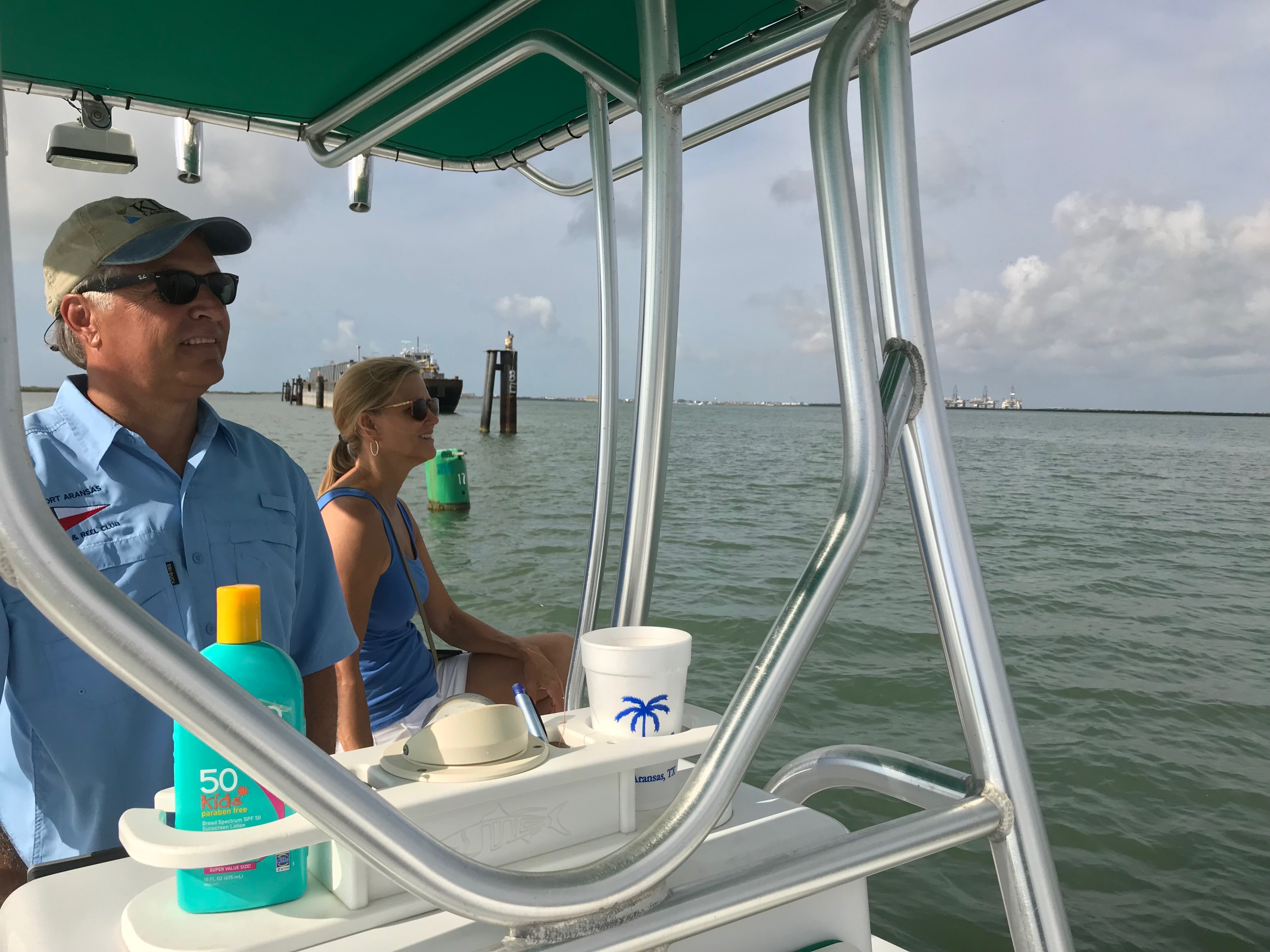 James and Tammy King cut through the waters outside Port Aransas, Texas. (Jamie Smith Hopkins / The Center for Public Integrity)
